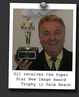 Gil receives the Super Star Award Trophy